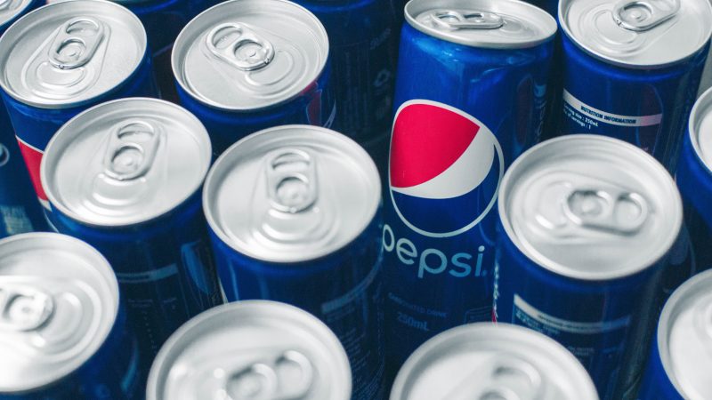 Close up of a group of pepsi cola cans, to show how we helped Pepsico implement their ERP system